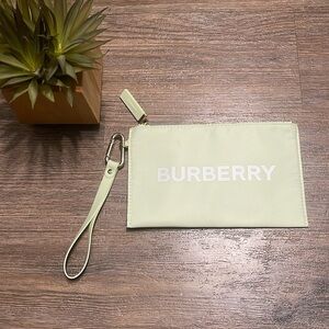 Green/yellow Burberry wristlet